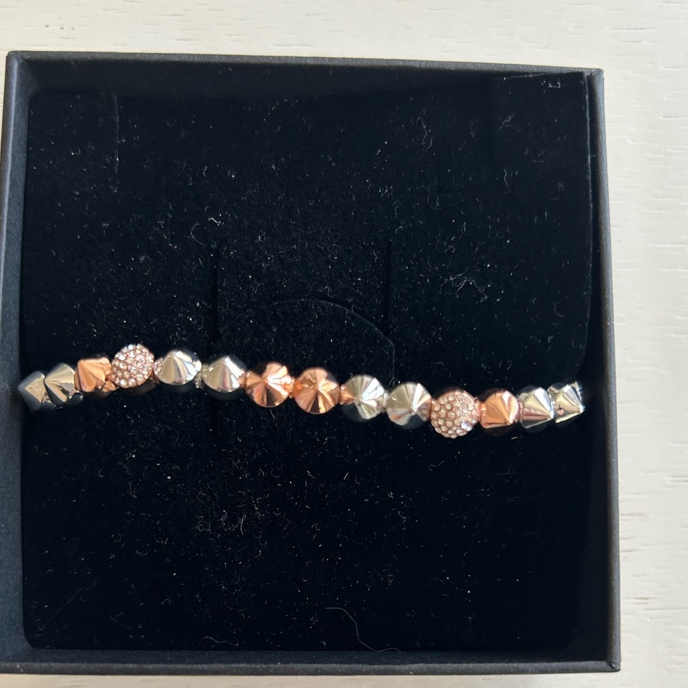 Elegant Silver and Rose Gold Bracelet